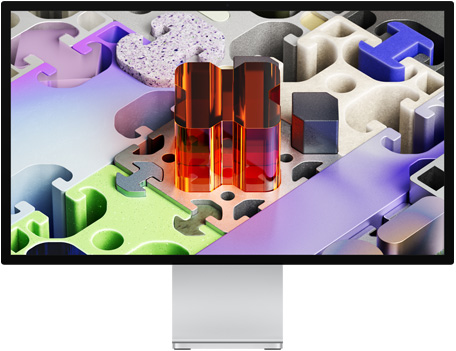 ด้านหน้าของ Studio Display XDR พร้อมภาพพื้นหลังแบบสามมิติที่ดูคล้ายจิ๊กซอว์