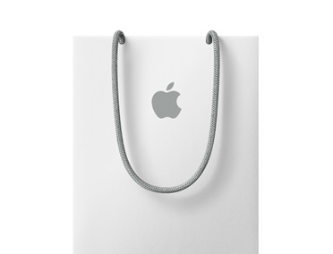위쪽에 Apple 로고가 있는 하얀색 Apple 쇼핑백